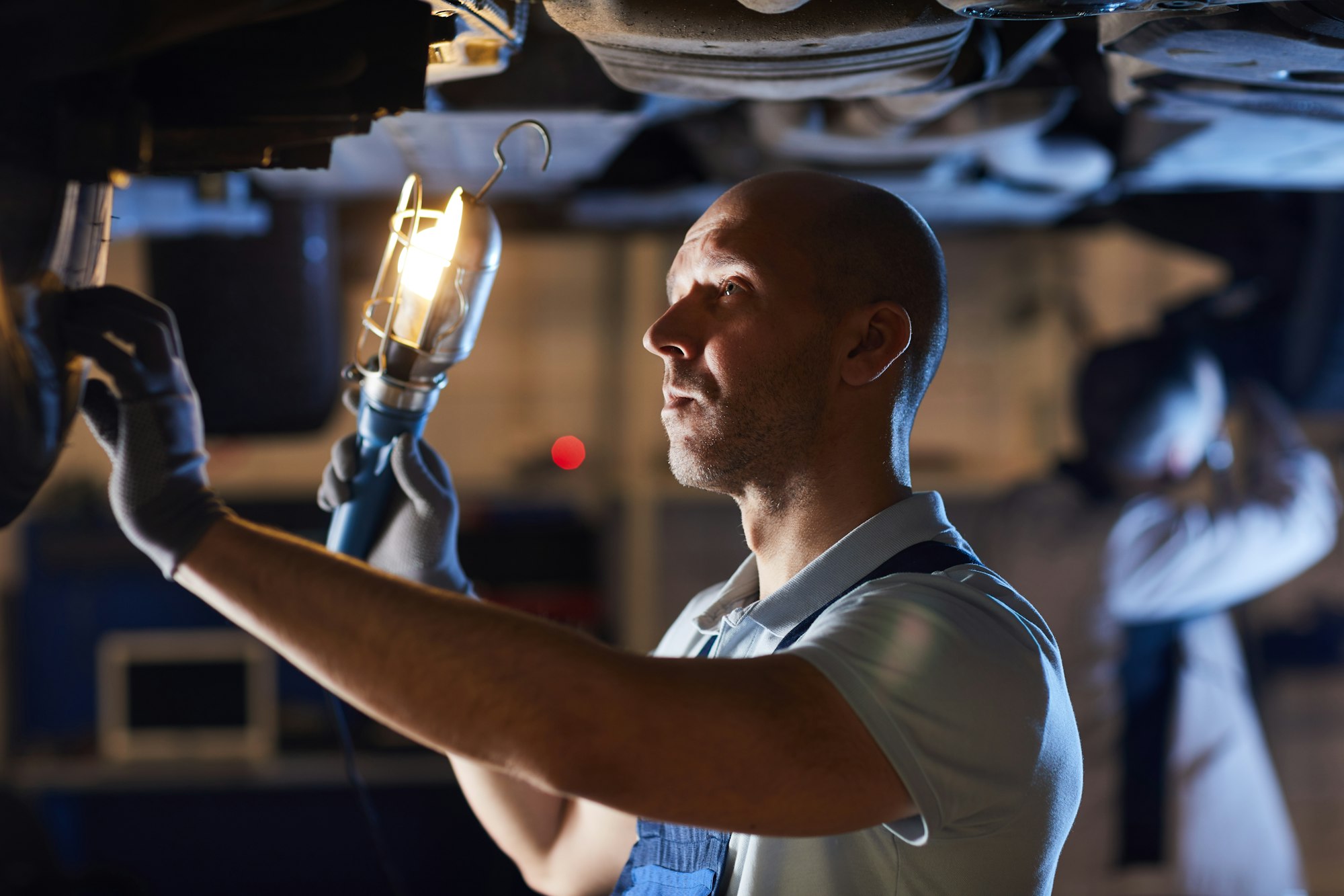 Mechanic Fixing Car